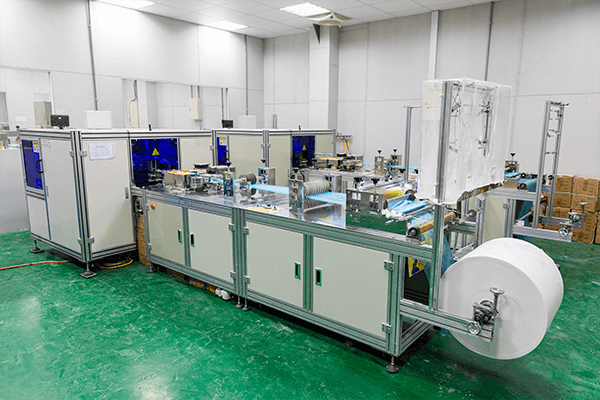Cleanroom production line with rolls of material